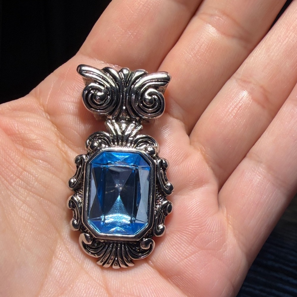 Vintage Silver-Tone Brooch with Blue Faceted Stone